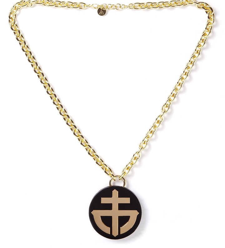 AMBUSH® - Gold/Black Bike Crest Necklace | HBX - HYPEBEAST 为您搜罗全球潮流时尚品牌