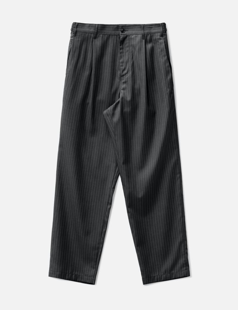 Stüssy - Stripe Volume Pleated Trousers | HBX - HYPEBEAST 为您搜罗